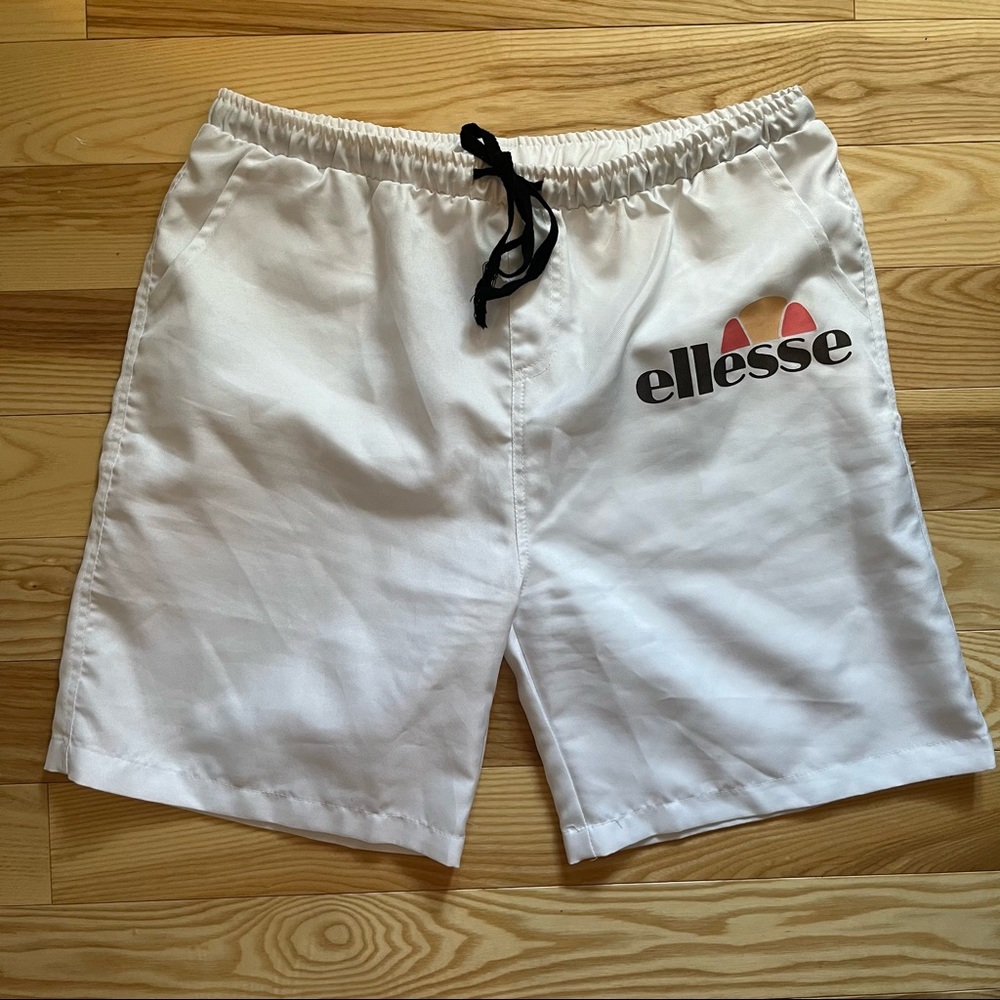 Ellesse White Shorts with Black Drawstring and Red/Orange Logo